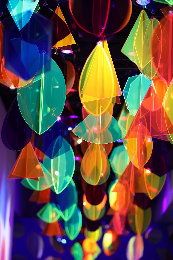 Colorful abstract glass installation with vivid lights in a Melbourne art museum.